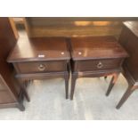 A PAIR OF STAG BEDSIDE TABLES