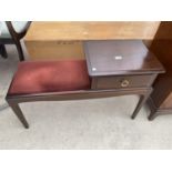 A STAG MINSTREL MAHOGANY TELEPHONE SEAT