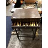 AN OAK CUTLERY BUREAU WITH SINGLE DRAWER AND HINGED TOP (HINGES A/F)