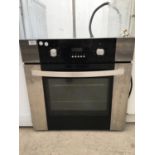 AN INTEGRATED OVEN AND GRILL VERY CLEAN BELIEVED WORKING BUT NO WARRANTY