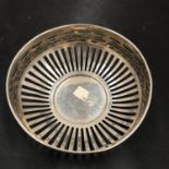 A SILVER ROUND PIERCED BOWL