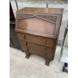 A MID 20TH CENTURY OAK BUREAU, 30" WIDE