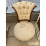 A VICTORIAN WALNUT BUTTON-BACK NURSING CHAIR ON TURNED AND FLUTED LEGS