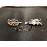 THREE SILVER BROOCHES