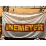 A FULL SIZE WHITE FLAG WITH A YELLOW AND RED NEIMEYER LOGO