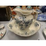 A VINTAGE BLUE AND WHITE CHINA WASH BOWL AND JUG (A/F)