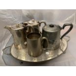 VARIOUS SILVER PLATED TEAPOTS AND JUGS ON A TRAY