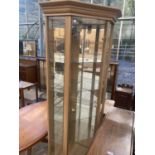 A MODERN OAK EFFECT GLAZED CORNER DISPLAY UNIT, 33" WIDE