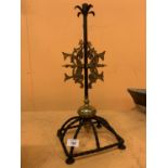 A PUGIN STYLE GOTHIC METAL CANDLESTICK
