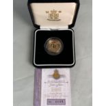 A 2002 QUARTER OUNCE GOLD PROOF £25 COIN IN PRESENTATION BOX WITH CERTIFICATE