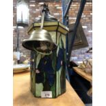 AN ART DECO GLASS LAMPSHADE WITH A BLUE AND GREEN IRIS DESIGN AND METAL FITTINGS