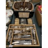 A SUBSTANTIAL SELECTION OF SILVER PLATED CUTLERY TO INCLUDE A WICKER BASKET