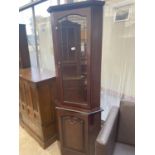 A MODERN THAMES MAHOGANY CORNER CABINET WITH GLAZED UPPER PORTION AND CUPBOARD TO BASE, 27" WIDE