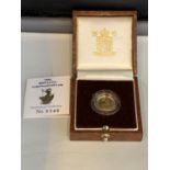 A BRITANNIA 1995 1/10TH oz GOLD PROOF £10 COIN IN PRESENTATION BOX WITH CERTIFICATE