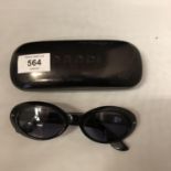 A PAIR OF GUCCI SUNGLASSES WITH CASE