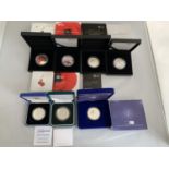 SEVEN VARIOUS SILVER PROOF £5 COINS IN PRESENTATION BOXES WITH CERTIFICATES