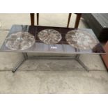 A 1970'S STYLE TILE TOP COFFEE TABLE ON CHROME BASE 42 INCHES X 18 INCHES