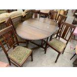 SIX EARLY 20TH CENTURY OAK DINING CHAIRS AND A LATER GATELEG TABLE