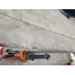 A HEDGE TRIMMER AND LONG REACH LOPPERS