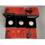 THREE ROYAL MINT SILVER PROOF ONE OUNCE COINS COMMEMORATING THE LUNAR YEAR WITH PRESENTATION BOXES