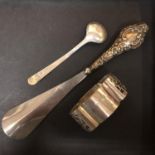 A HALLMARKED SILVER SHOE HORN 38G, A HALLMARKED SILVER NAPKIN RING 20G AND A HALLMARKED SILVER SPOON