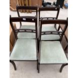 A SET OF FOUR REGENCY STYLE DINING CHAIRS