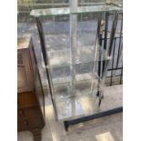 A GLASS FOUR TIER OPEN DISPLAY STAND, 28" WIDE