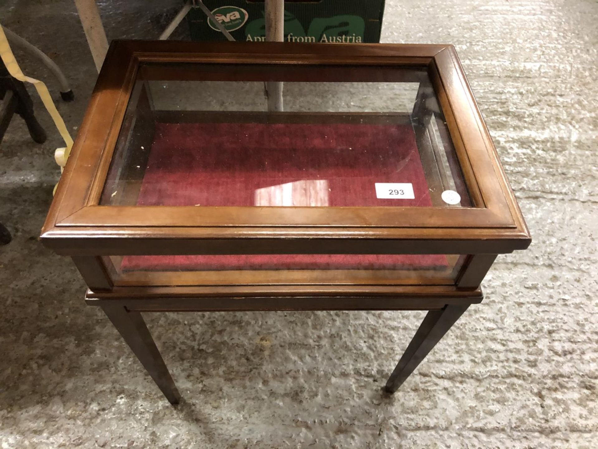 A MAHOGANY FOUR LEGGED DISPLAY CABINET