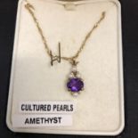 AN AMETHYST AND CULTURED PEARL PENDANT ON A 9CT GOLD NECKLACE 3.3 GRAMS