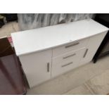 A MODERN WHITE SIDEBOARD WITH TWO DOORS AND THREE DRAWERS