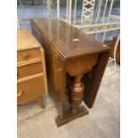 A MID 20TH CENTURY OAK DROP-LEAF TABLE