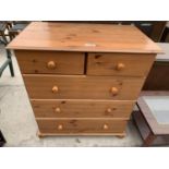 A MODERN PINE CHEST OF TWO SHORT AND THREE LONG DRAWERS
