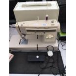 AN ELECTRIC SINGER SEWING MACHINE WITH CASE BELIEVED WORKING BUT NO WARRANTY