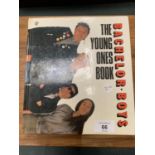 A HARD BACK COPY OF 'THE YOUNG ONES BOOK- BACHELOR BOYS' SIGNATURE IS A PRINT