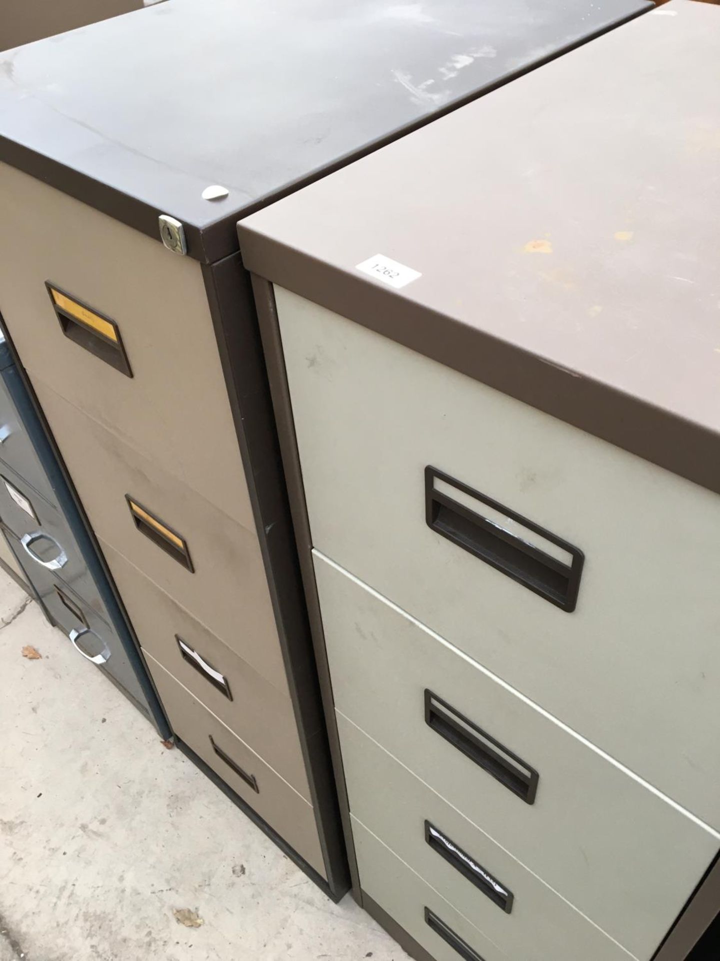 TWO FOUR DRAWER METAL FILING CABINETS TO INCLUDE A TRIUMPH