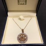 A ROYAL MINT THREE PENNY FLOWERS PENDANT SET IN A 9CT GOLD MOUNT AND NECKLACE 4.8 GRAMS