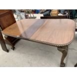 A VICTORIAN MAHOGANY ROPE EDGE EXTENDING DINING TABLE WITH TWO EXTRA LEAVES, ON BALL AND CLAW