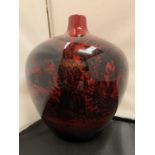 A ROYAL DOULTON FLAMBE WOODCUT 1616 VASE WITH EQUESTRIAN DESIGN