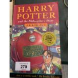 A FIRST EDITION PAPERBACK COPY OF 'HARRY POTTER AND THE PHILOSOPHER'S STONE'