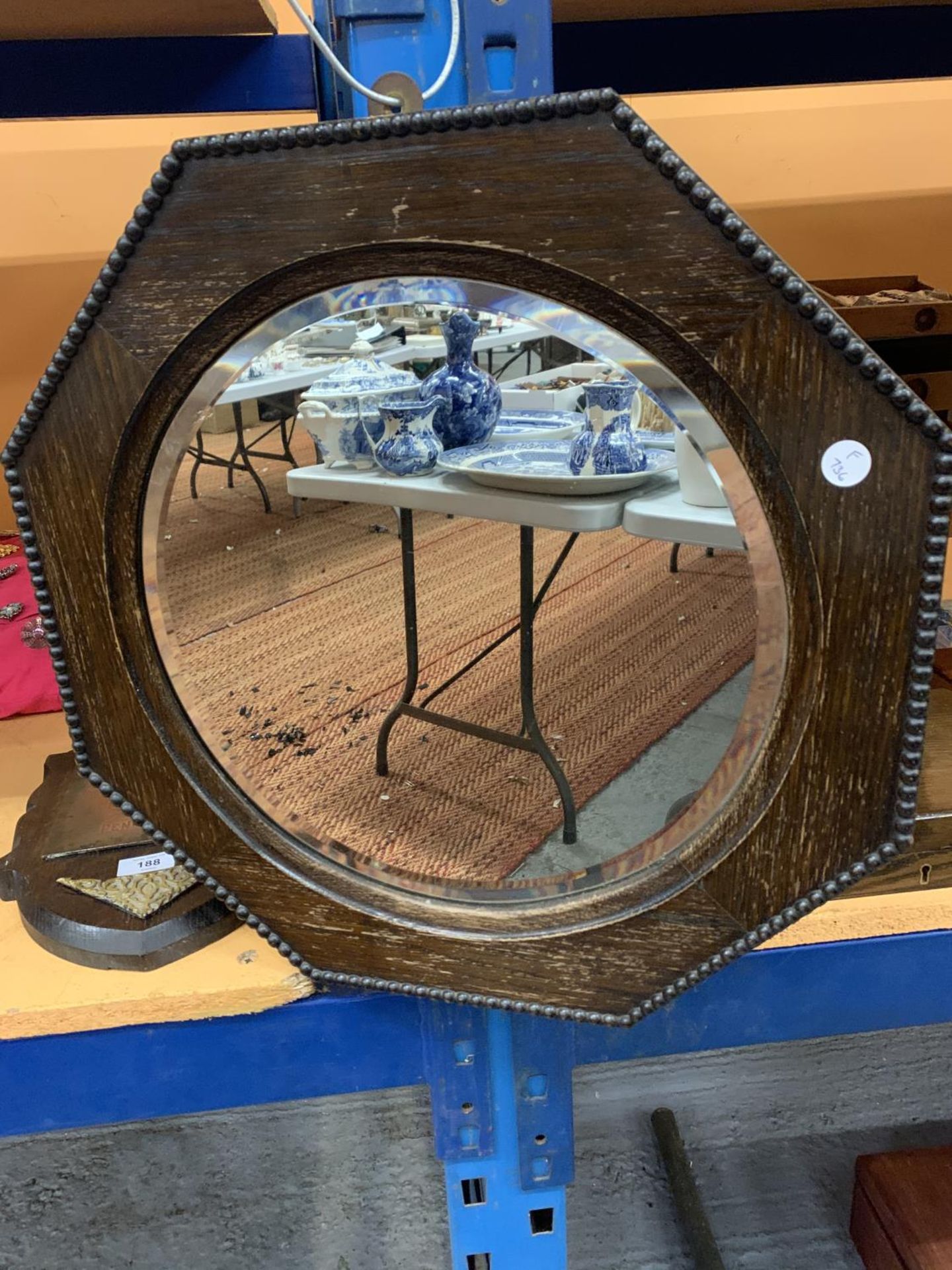 A WALL MIRROR WITH HANGING CHAIN WITH PATTERNED BEVEL AND A DARK WOOD OCTAGONAL FRAMED ROUND WALL - Image 5 of 9