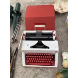 A VINTAGE OLYMPIA MONICA TYPEWRITER