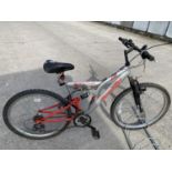 A SENTINEL APACHI MOUNTAIN BIKE WITH 21 GEARS SHIMANO