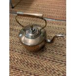 A LARGE BRASS AND COPPER AGA/FIRESIDE KETTLE