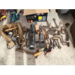 A LARGE QUANTITY OF VINTAGE TOOLS TO INCLUDE WOOD PLANES, FLAT IRON, HAMMERS ETC.