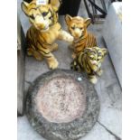 A STONE BIRD BATH TOP (AF) WITH THREE TIGER ORNAMENTS