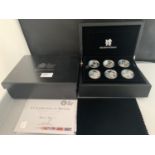 A BOXED 2010 ROYAL MINT SILVER PROOF CELEBRATION OF BRITAIN SET OF SIX 5 POUND COINS WITH