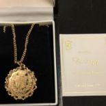 A ROYAL MINT TRILOGY 2002 SOVEREIGN PENDANT SET IN A 14CT GOLD MOUNT AND NECKLACE 19.1 GRAMS