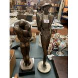 TWO MARKED RESIN FIGURES TO INCLUDE A LOVING COUPLE (1981) AND AN ART DECO STYLE LADY - AUSTIN