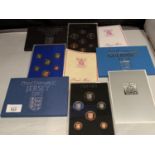 THREE JERSEY AND GUERNSEY CUPRO NICKEL PROOF COIN SETS IN PRESENTATION BOXES 1980 AND 1981