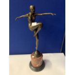 AN ART DECO STYLE BRONZE LADY ON A MARBLE AND ALABASTER BASE